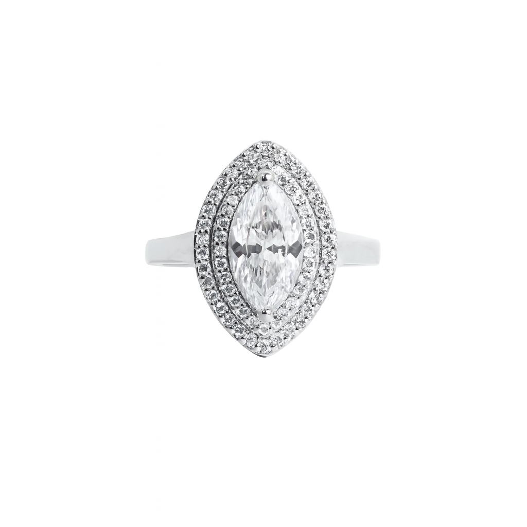 Diamond ring with a marquise-shaped center stone on a white background