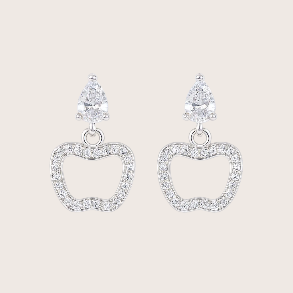 Silver heart-shaped earrings with clear gemstones on a white background