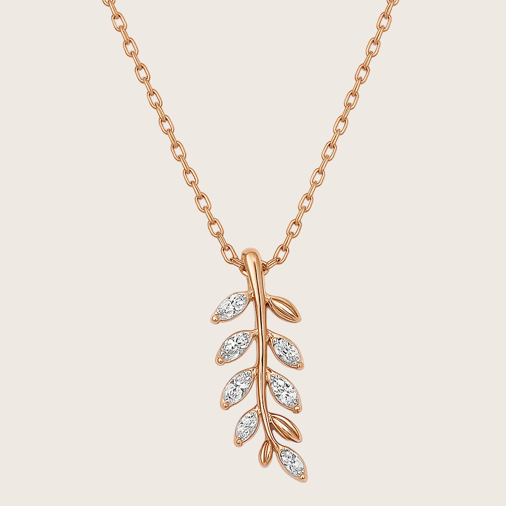Rose gold necklace with a leaf-shaped pendant on a white background