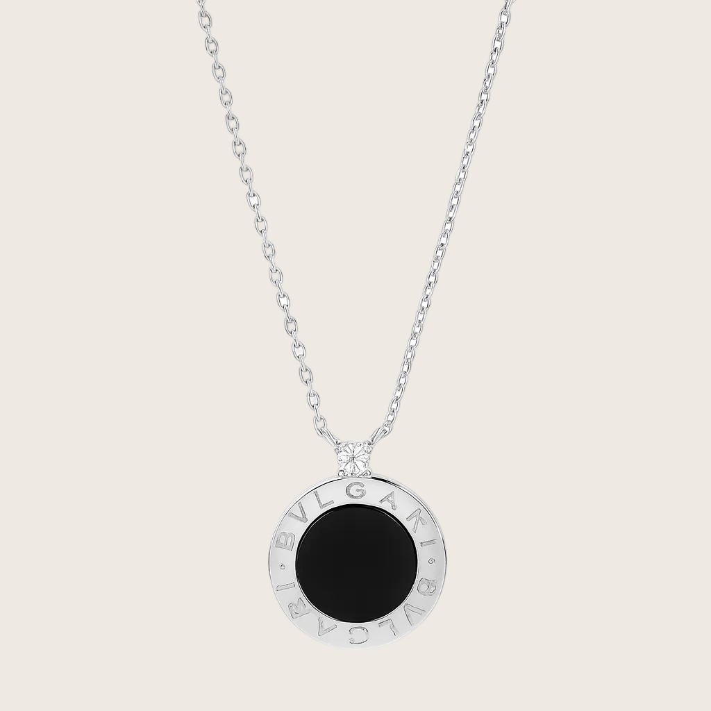 Bulgari necklace with a black stone on a white background
