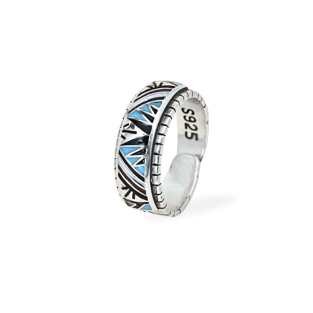 Silver ring with blue accents and 'S925' marking on a white background, branded 'TRISHNHA'.
