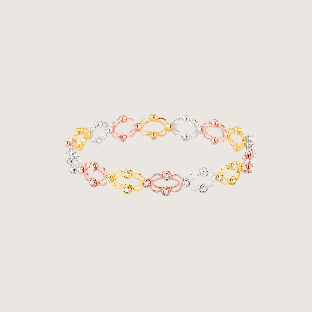 Three-colored bracelet on a light gray background