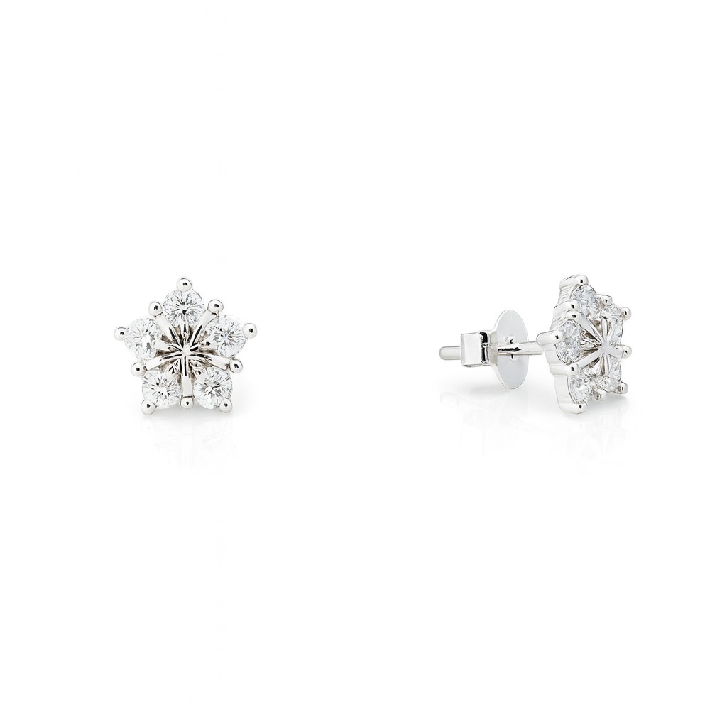Pair of diamond stud earrings on a white background