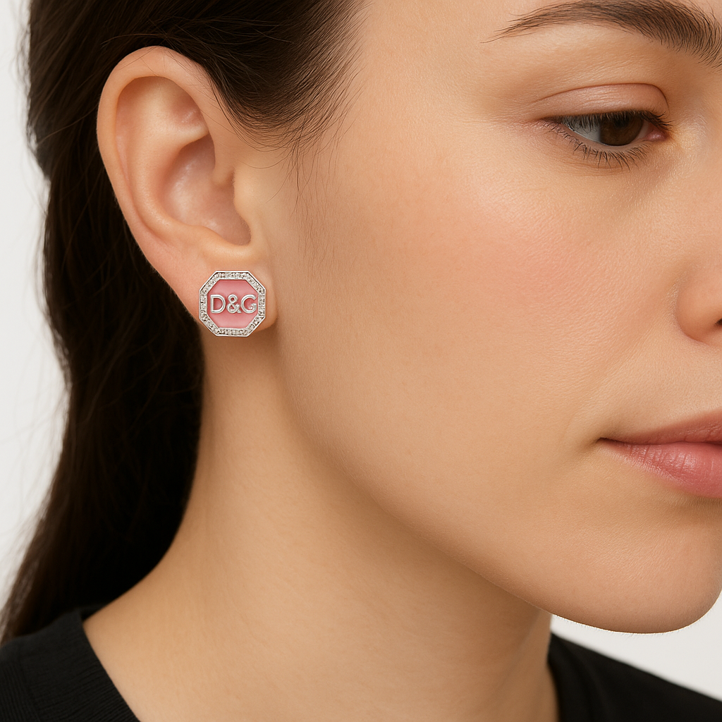 Close-up of a woman wearing a D&C earring with a neutral background