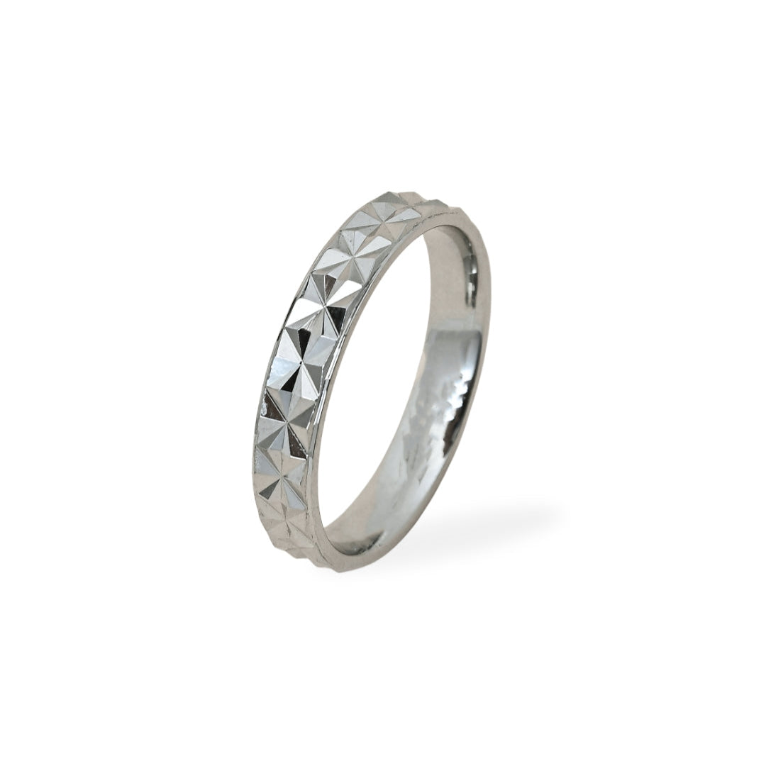 Silver ring with pyramid pattern on a white background, branded 'TRISHNNA'.