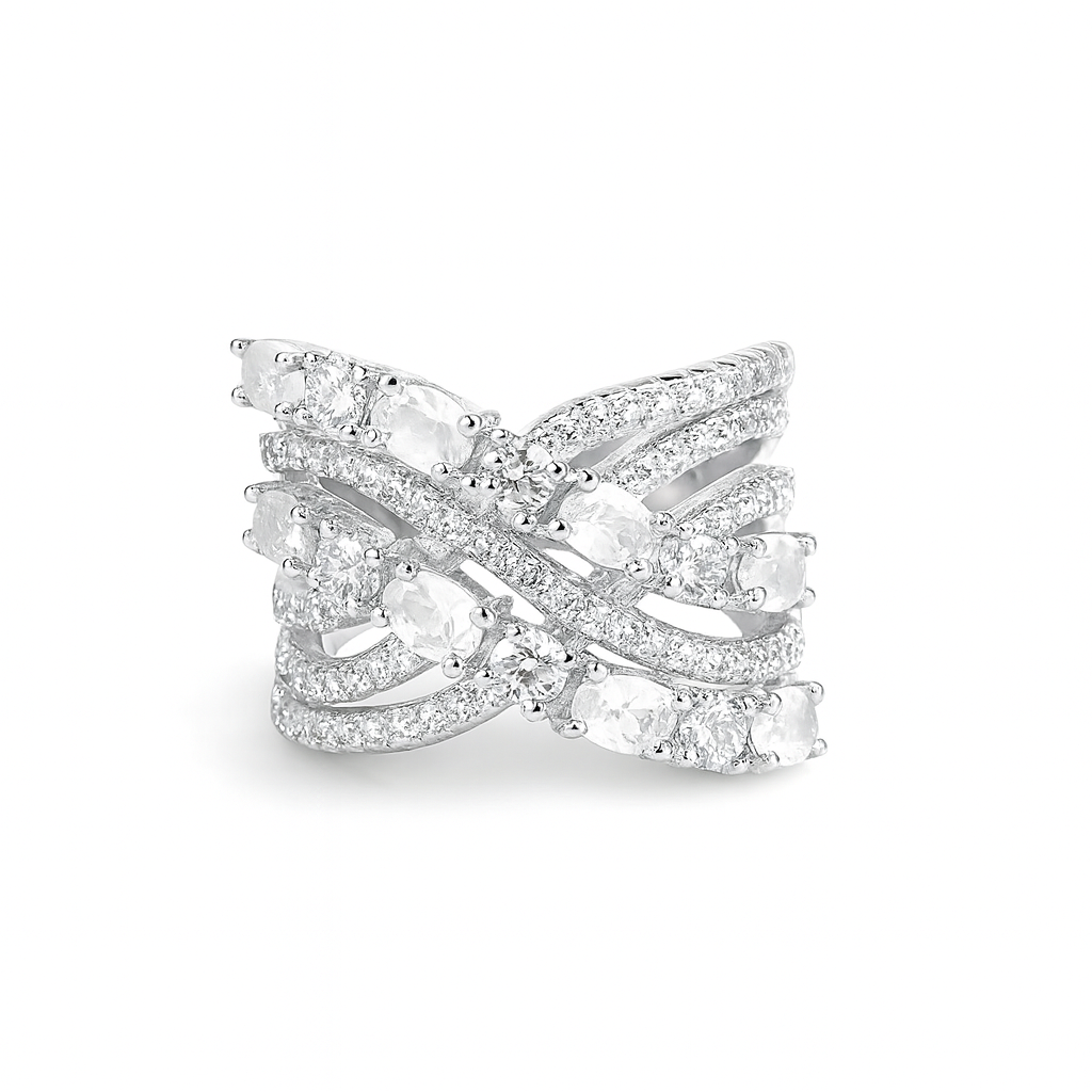 Silver ring with clear gemstones on a white background