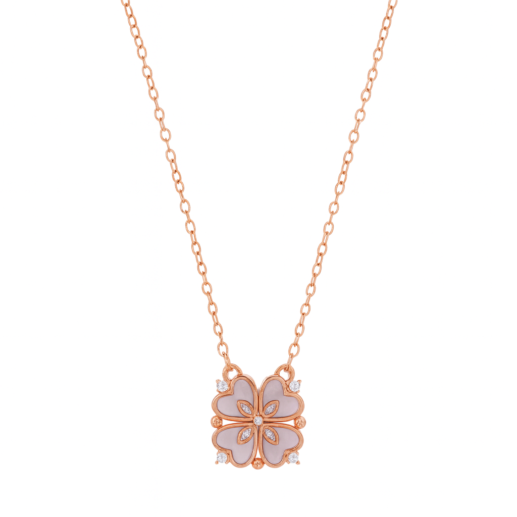 Rose gold necklace with a floral pendant on a white background