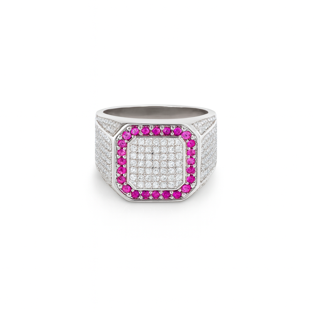 Silver ring with pink gemstones on a white background