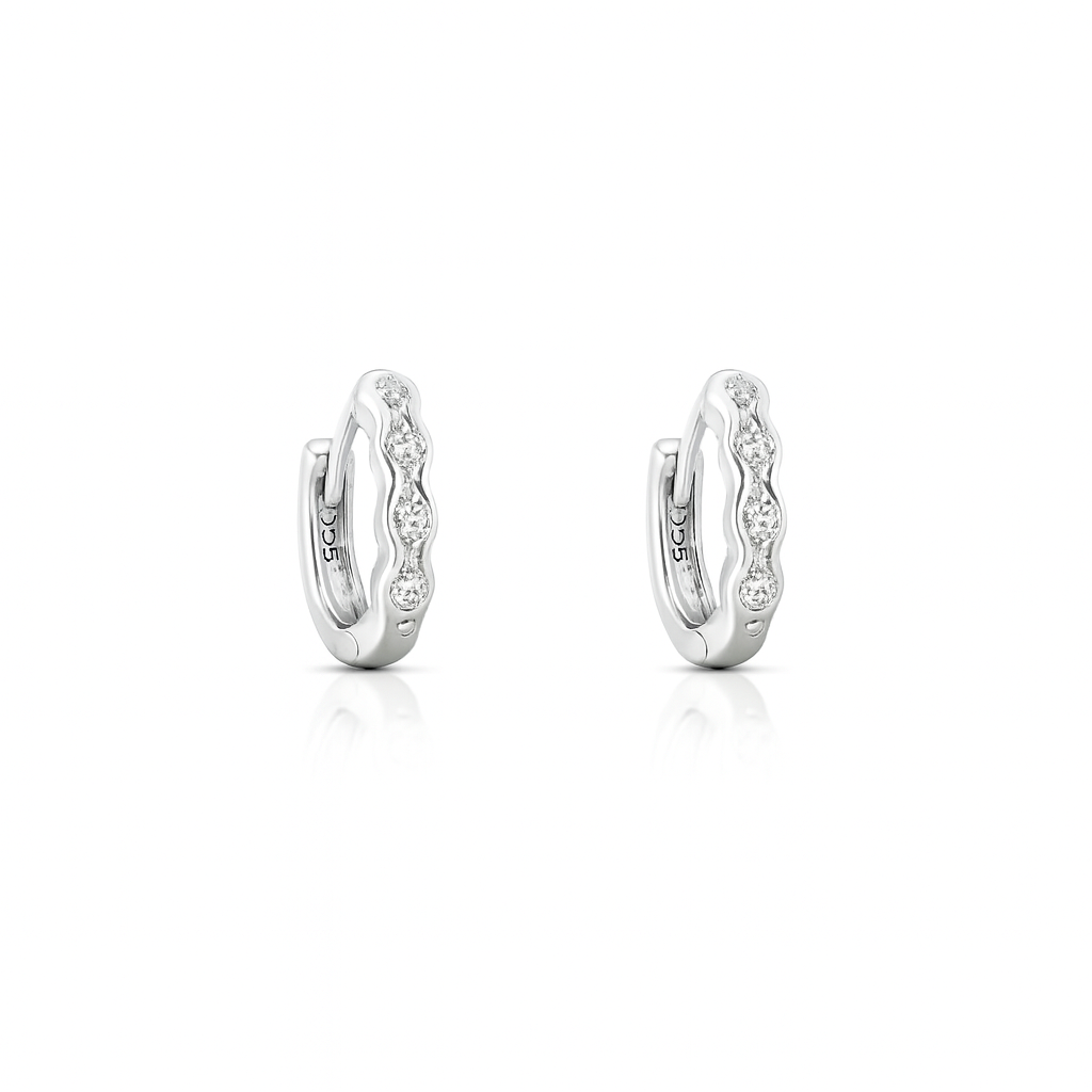 Pair of silver hoop earrings with small diamonds on a white background