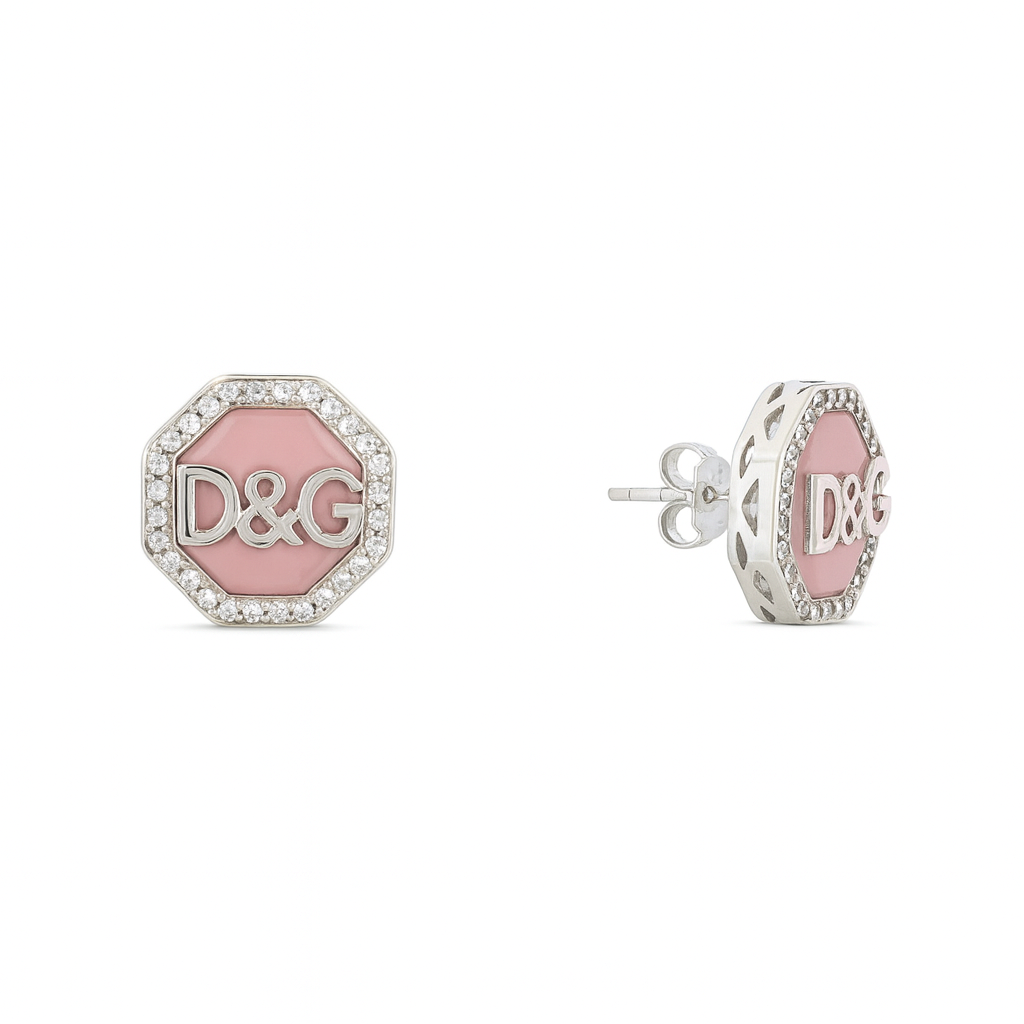 Pink earrings with silver D&G logo on a white background