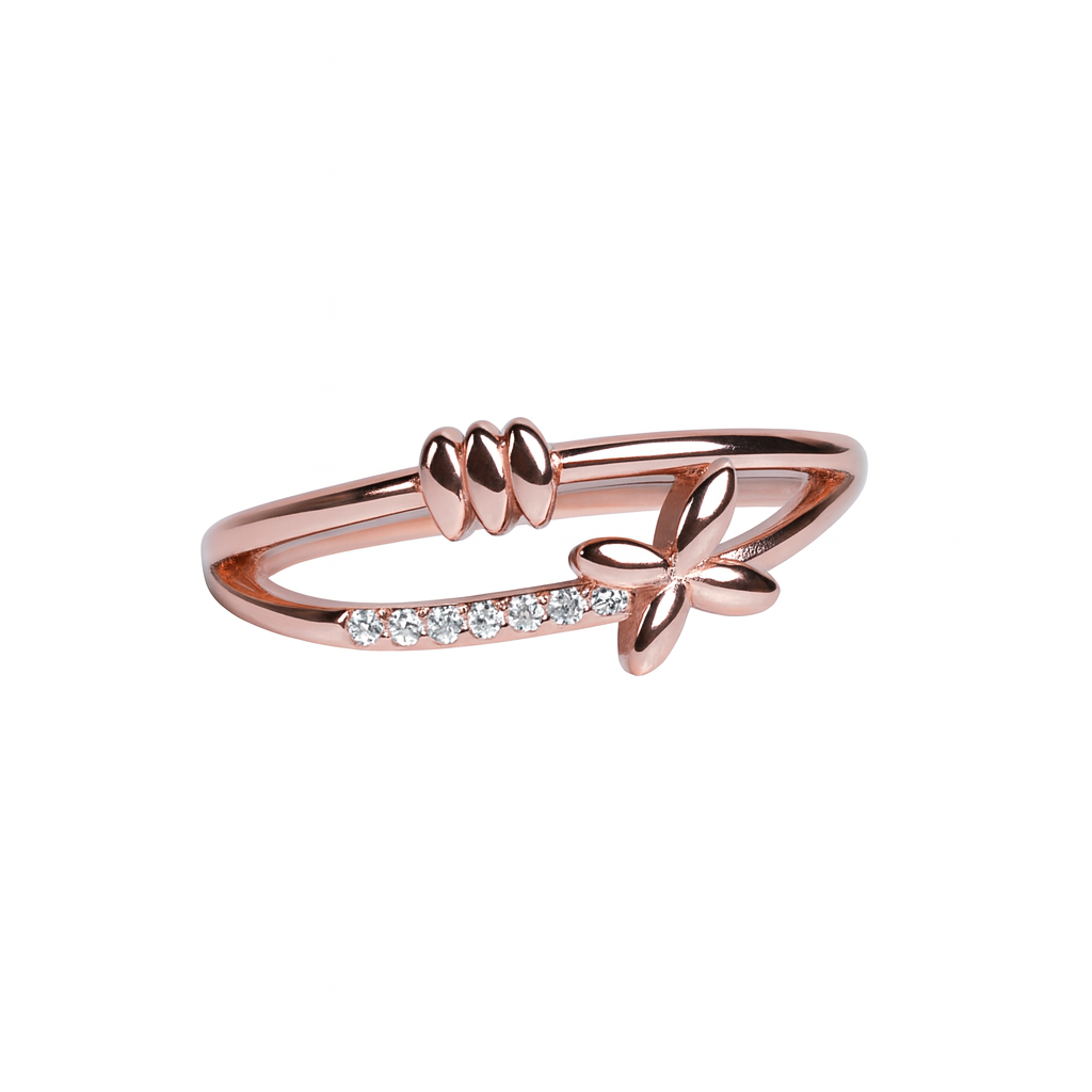 Rose gold ring with butterfly design on a white background