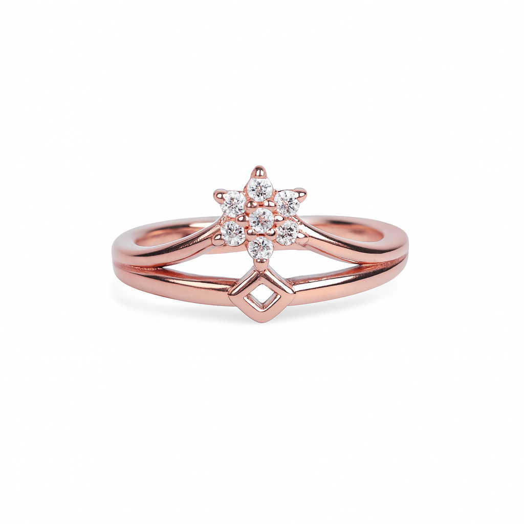 Rose gold ring with diamond accents on a white background