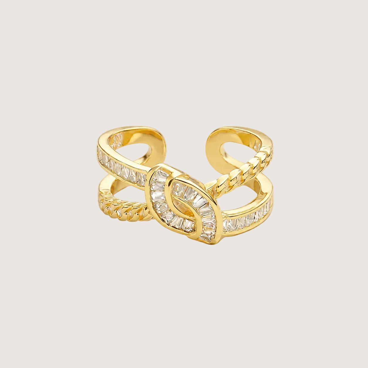 Gold ring with diamond accents on a light beige background
