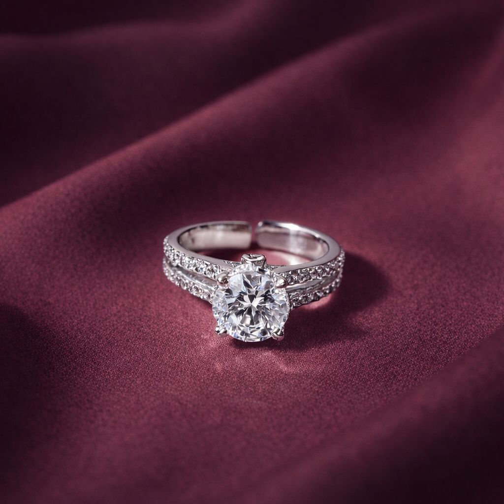 Diamond ring on a burgundy fabric background