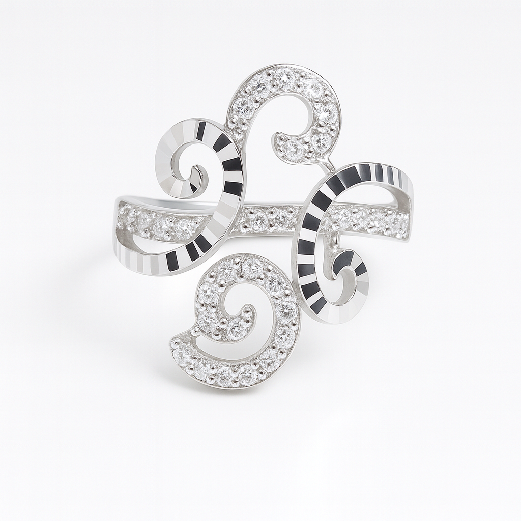 Silver brooch with intricate design on a white background