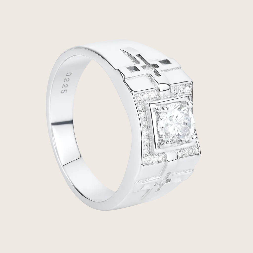 Silver ring with a diamond on a white background