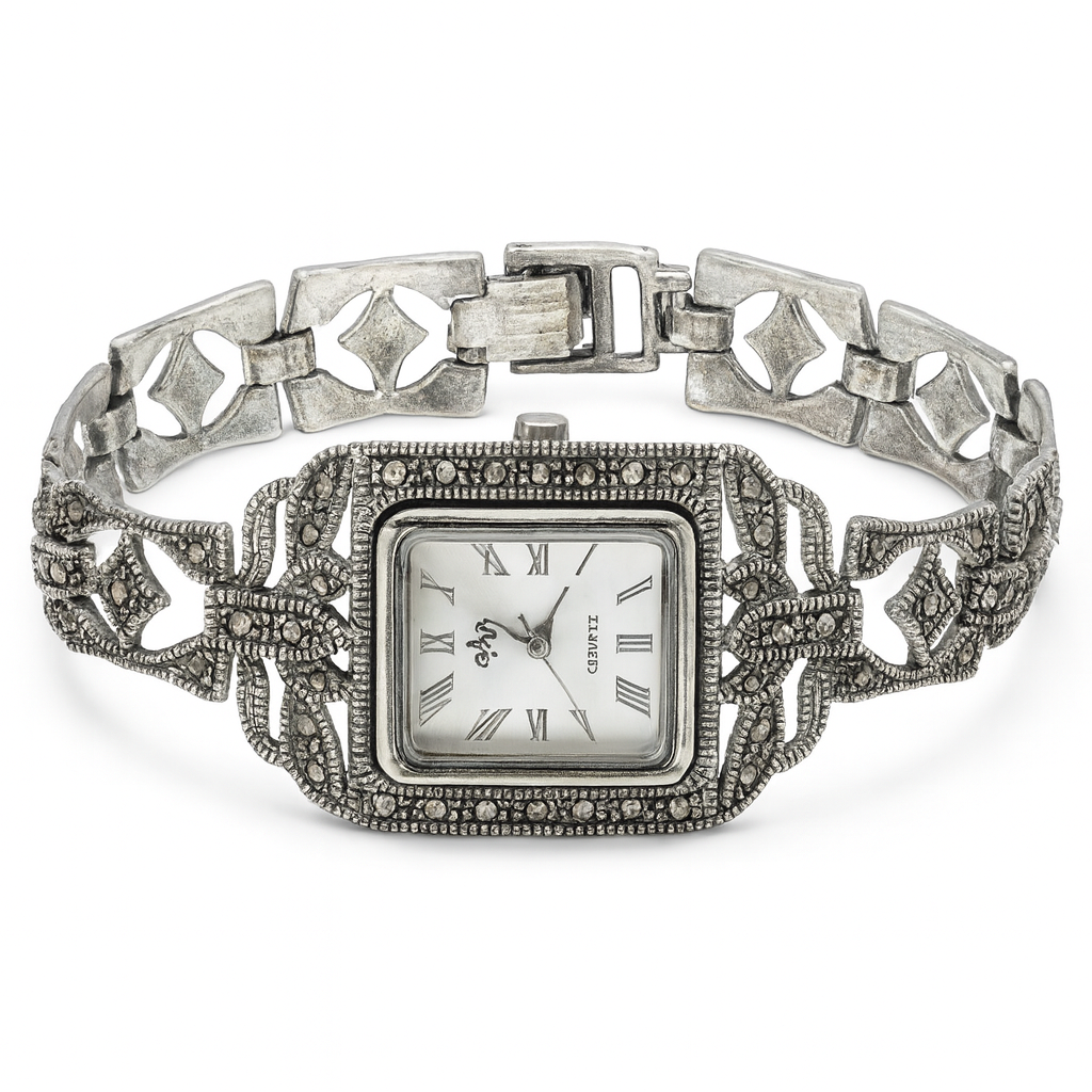 Silver watch with intricate design on a white background