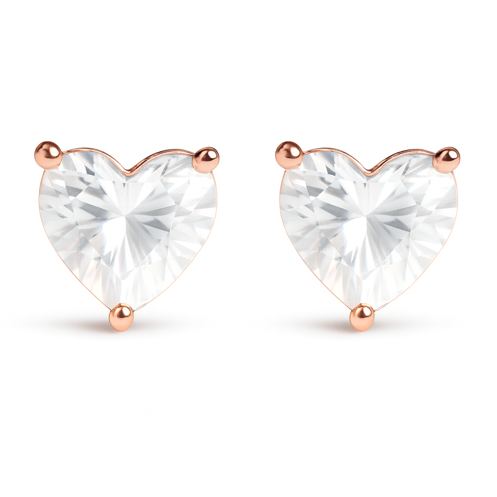 Heart-shaped earrings with rose gold posts on a white background