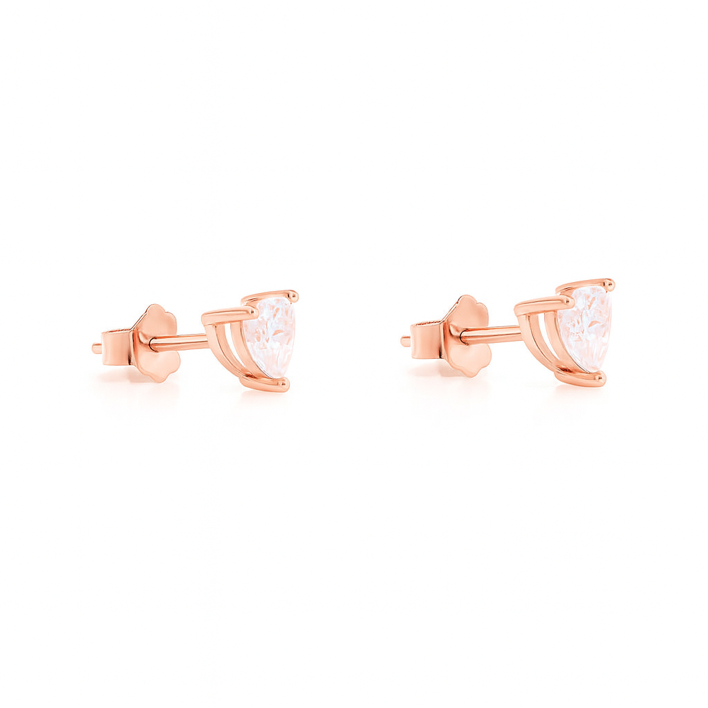 Rose gold earrings with clear gemstones on a white background