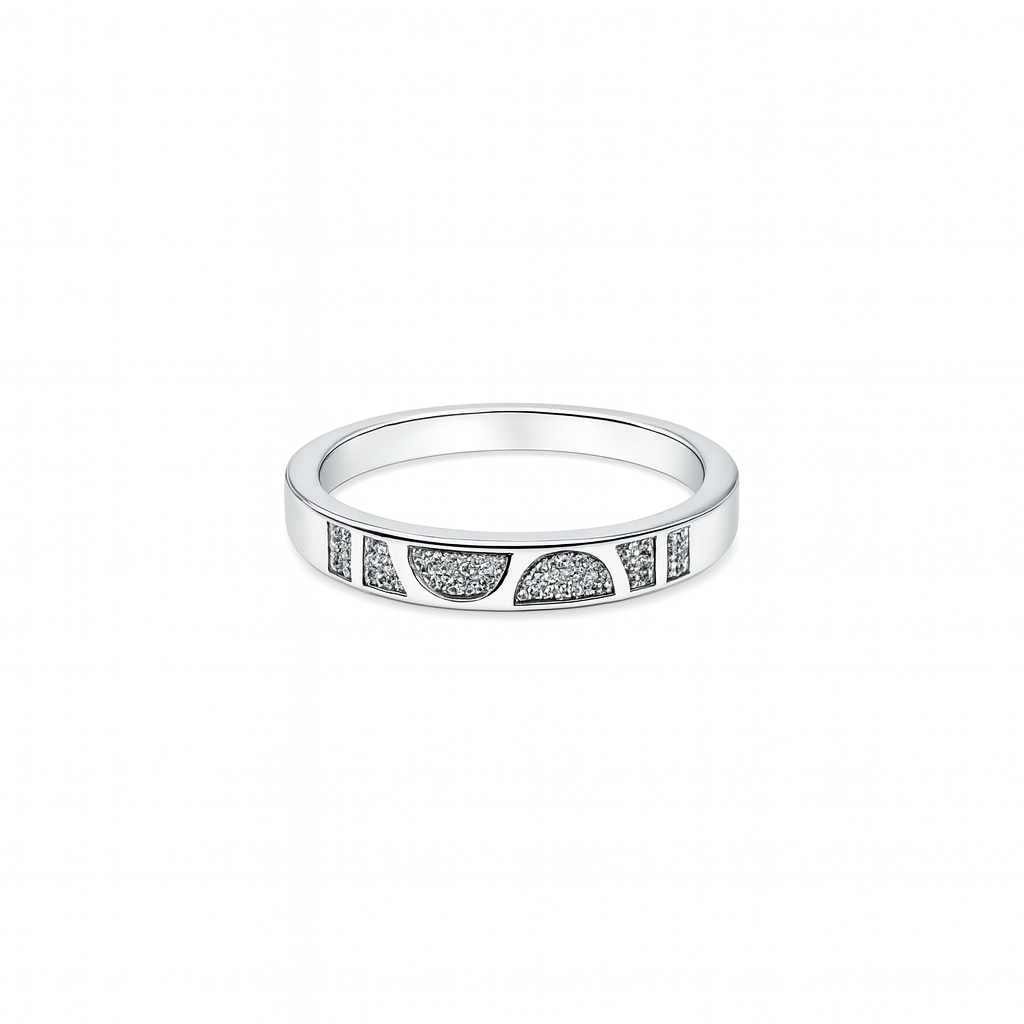 Silver ring with embedded stones on a white background