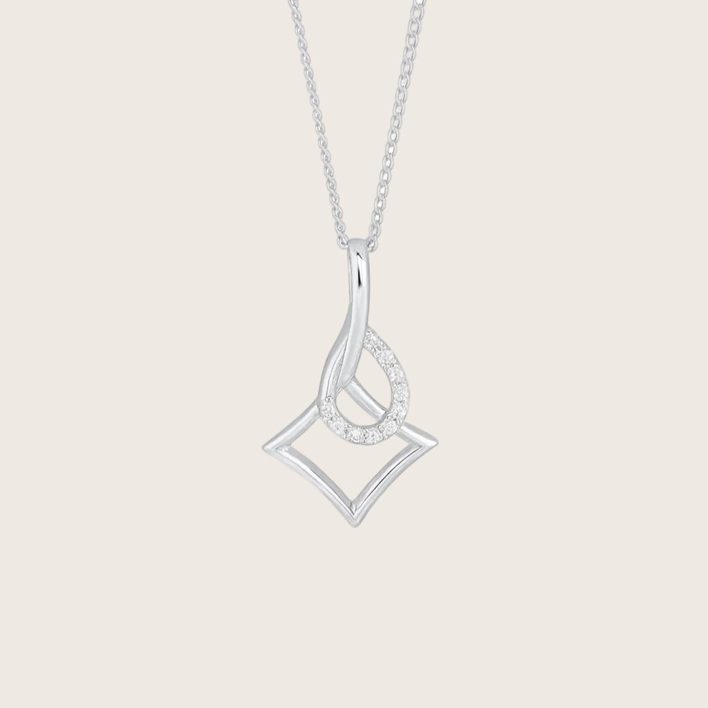 Silver necklace with a geometric pendant on a white background