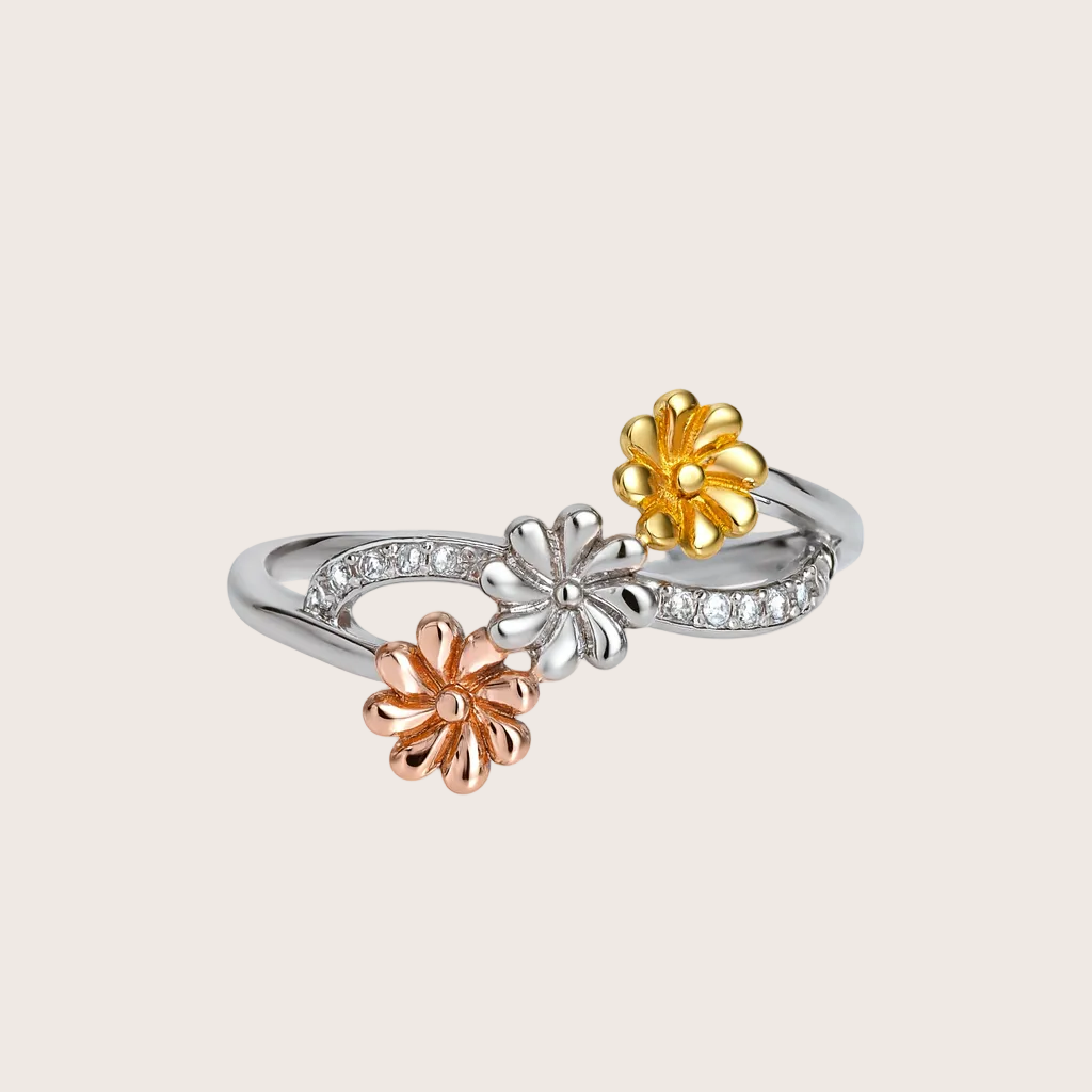 Three-colored floral ring on a white background