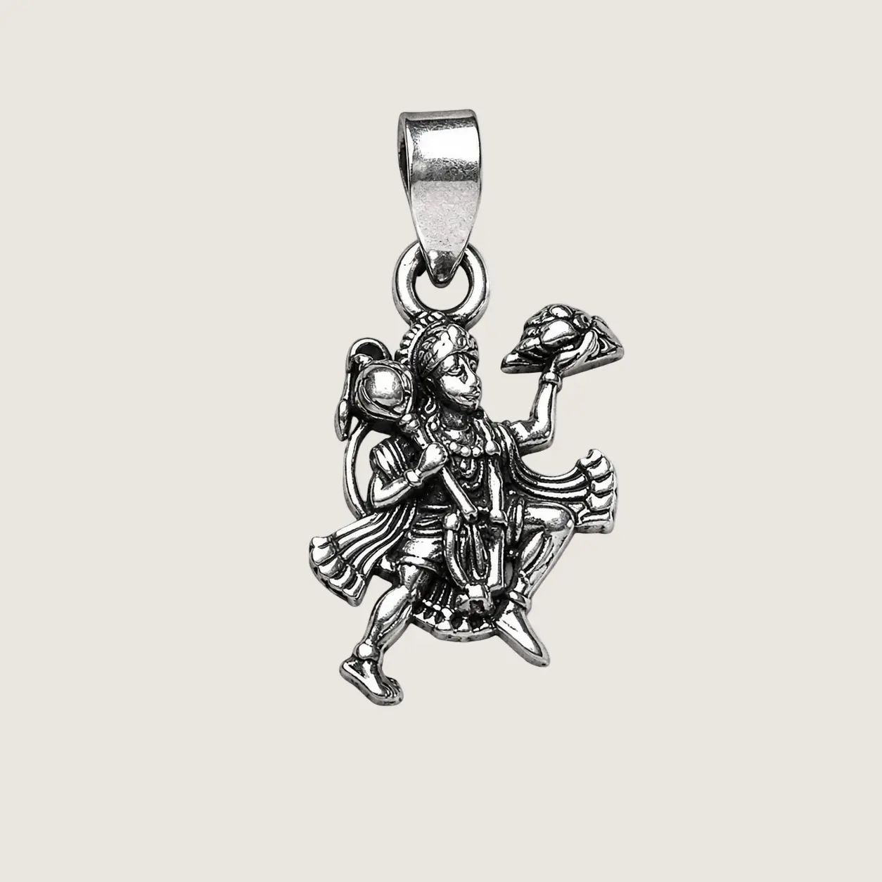 Silver pendant with an angel design on a white background