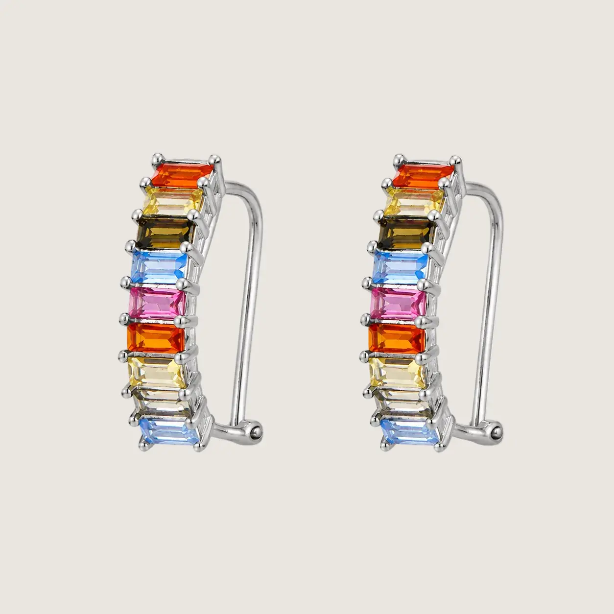 Multicolored gemstone earrings on a light gray background