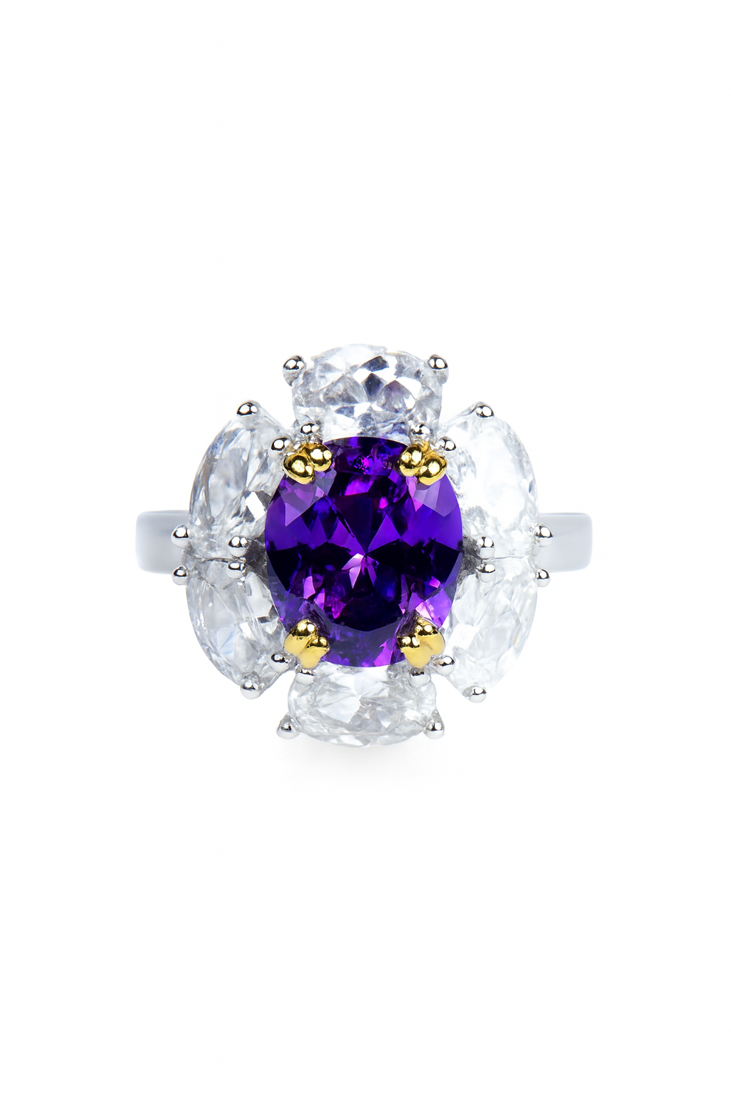 Ring with a purple gemstone and white stones on a white background