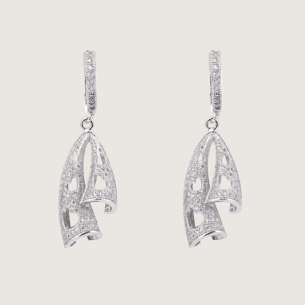 Silver elephant hoop earrings on a white background