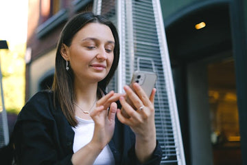 Modern working women wears silver earrings