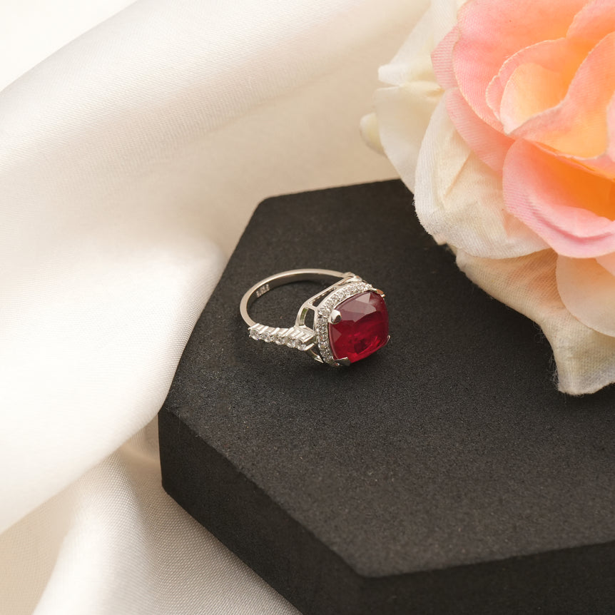 SILVER RING WITH SHINY RED STONE