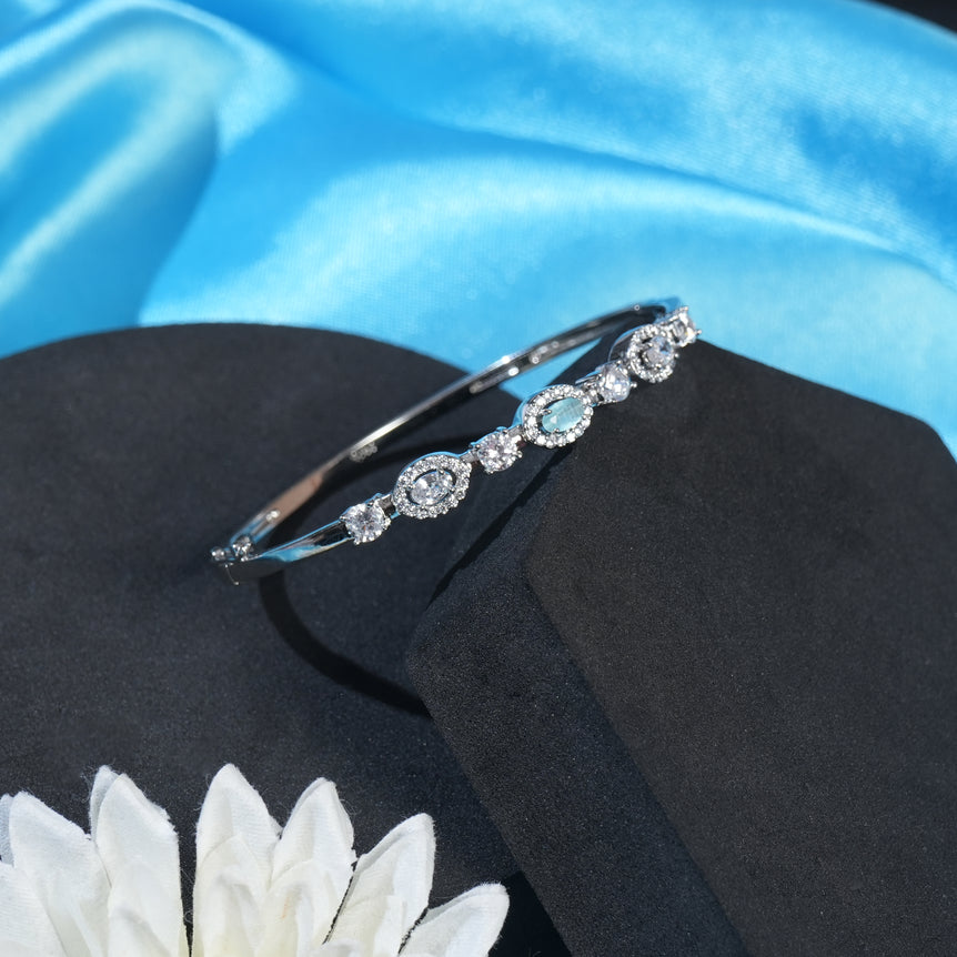 silver bracelet with sparkling cobalt blue stone