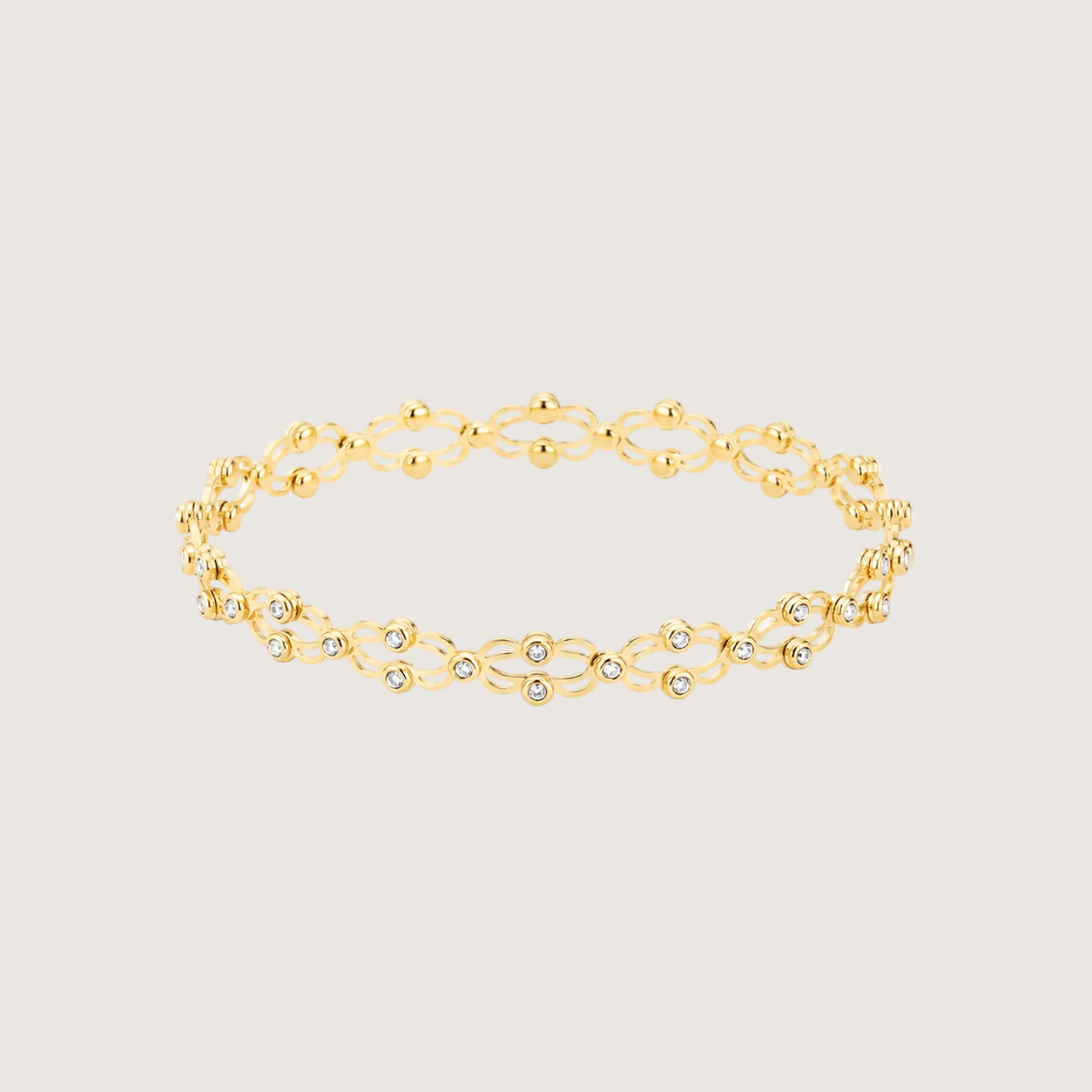 Gold bracelet with interlocking links on a light gray background