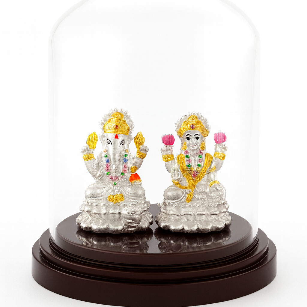 Decorative figurines of a couple under a glass dome on a white background