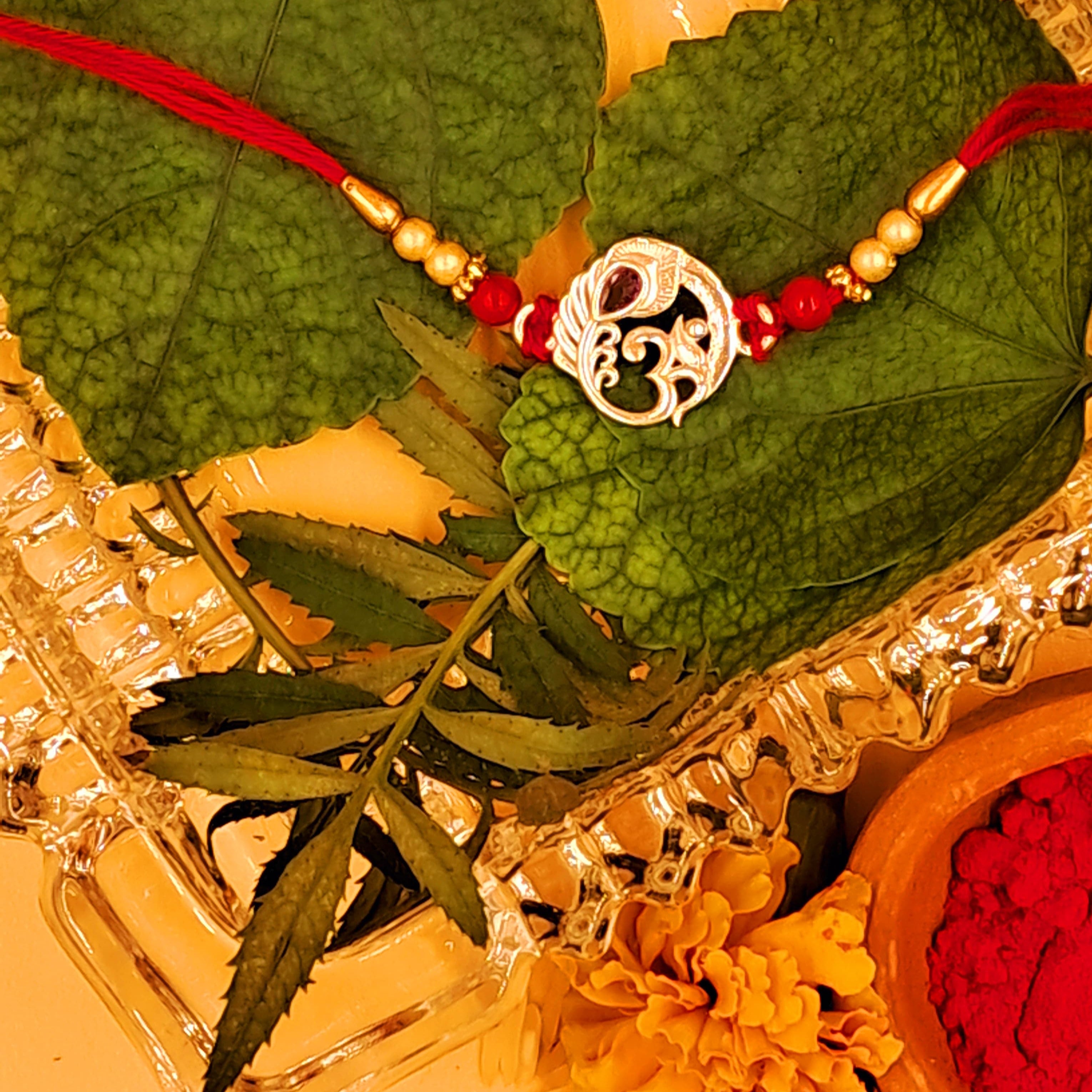 OM Morpankh silver rakhi