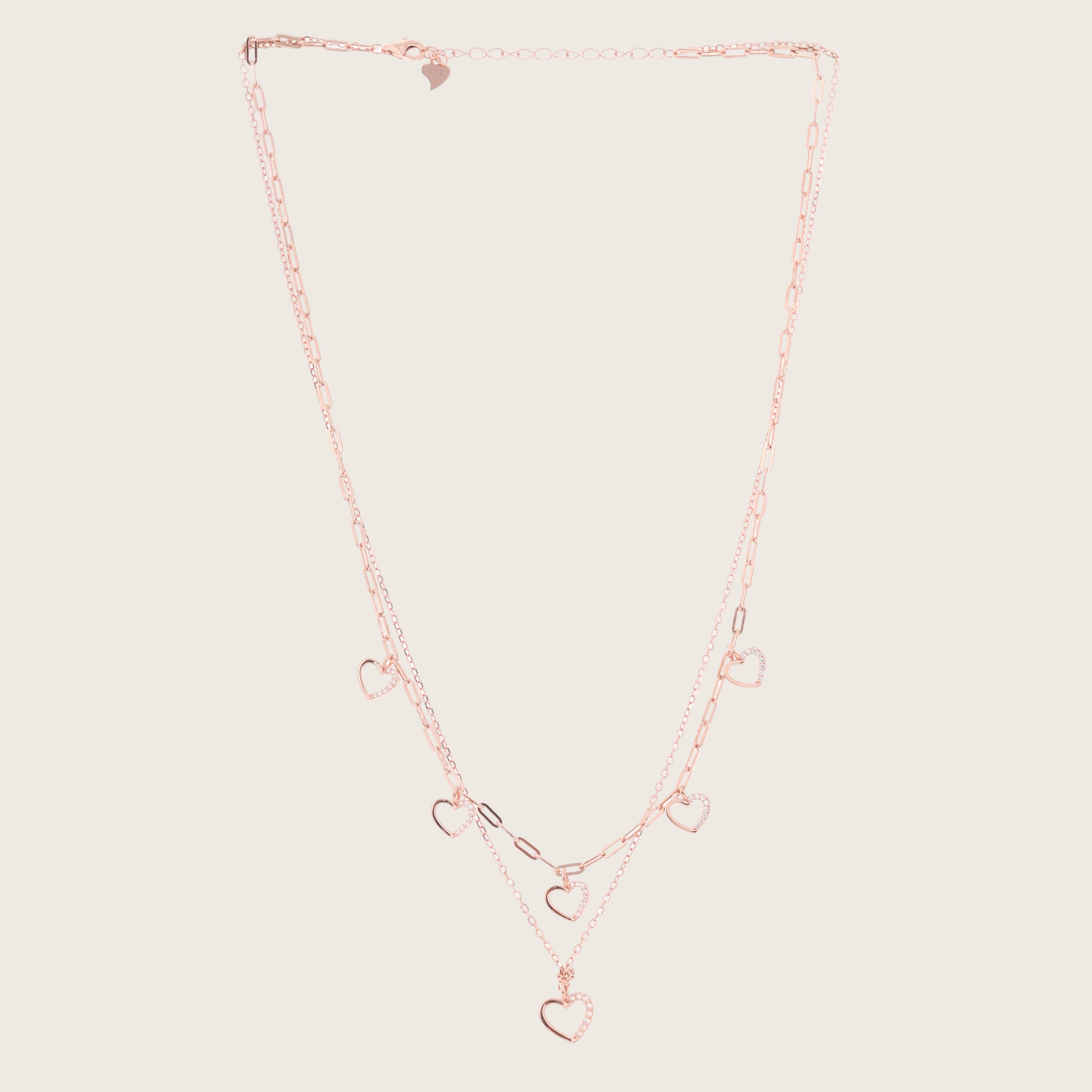 Necklace with heart-shaped pendants on a black background