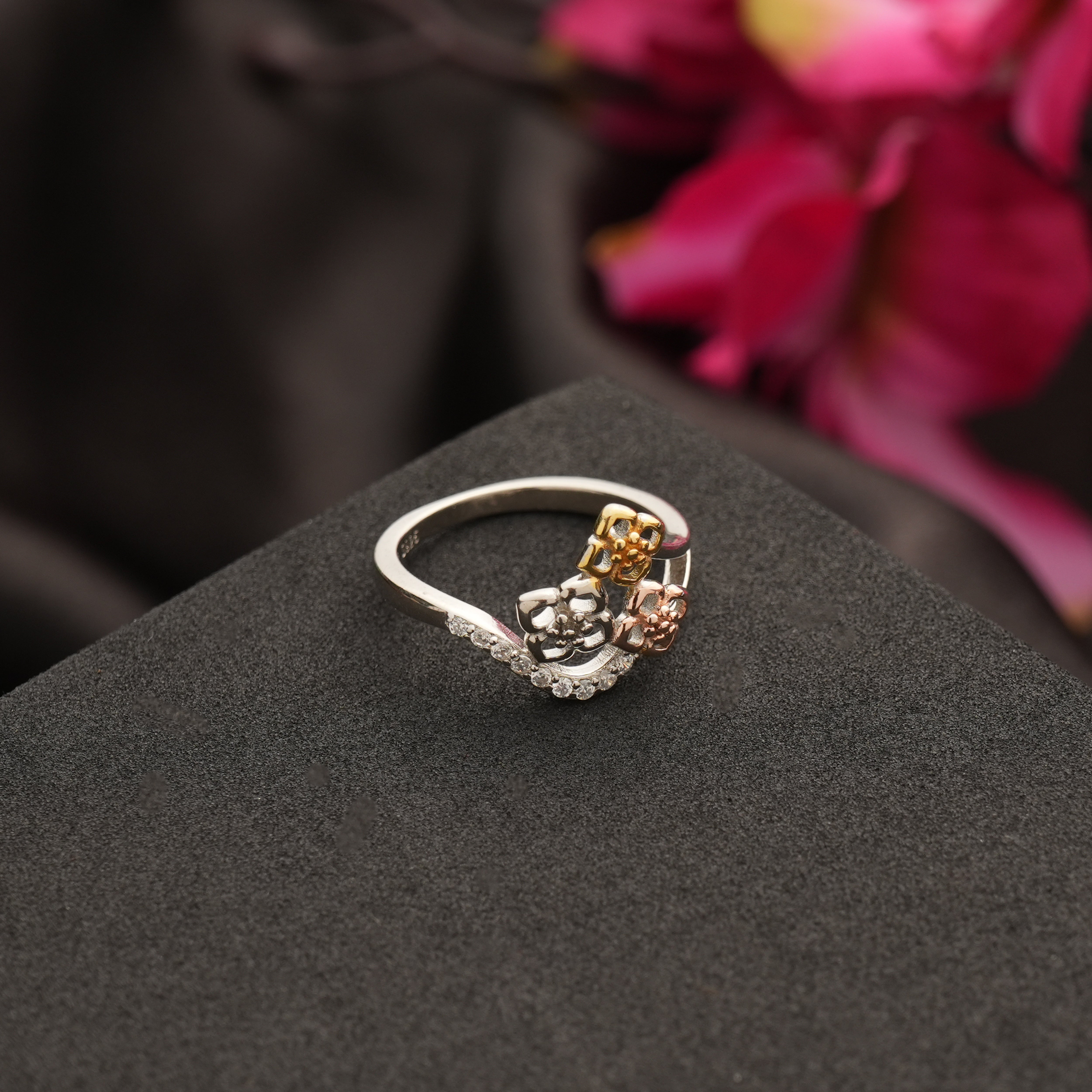 elegant silver ring for women placed on black box