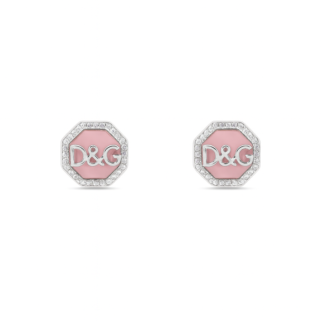 Pair of earrings with pink octagonal D&G logo on a white background